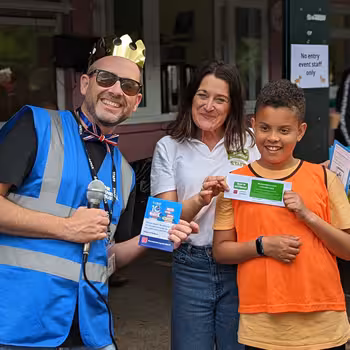 Three people at a fundraising event